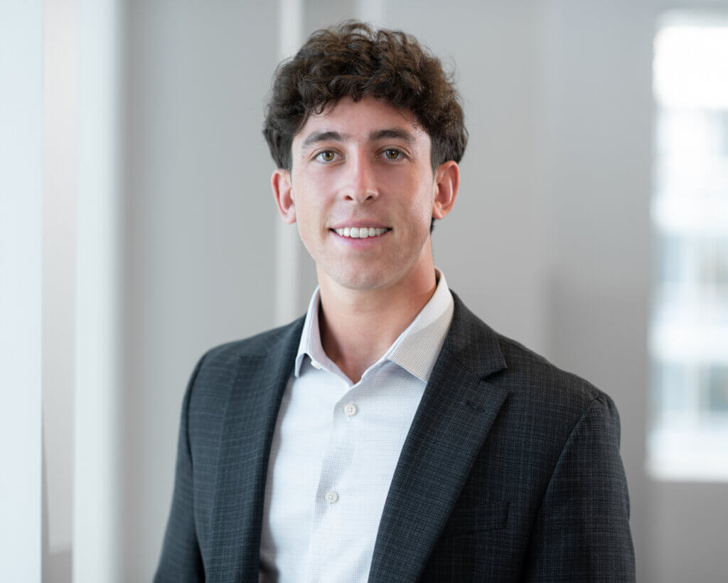 man in black suit jacket and white button up